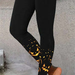 Lily pumpkin ankle leggings in black, front view