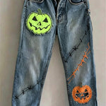 Celeste pumpkin skull straight leg jeans in blue, front view
