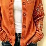 Maria pumpkin print cardigan in orange, detail view