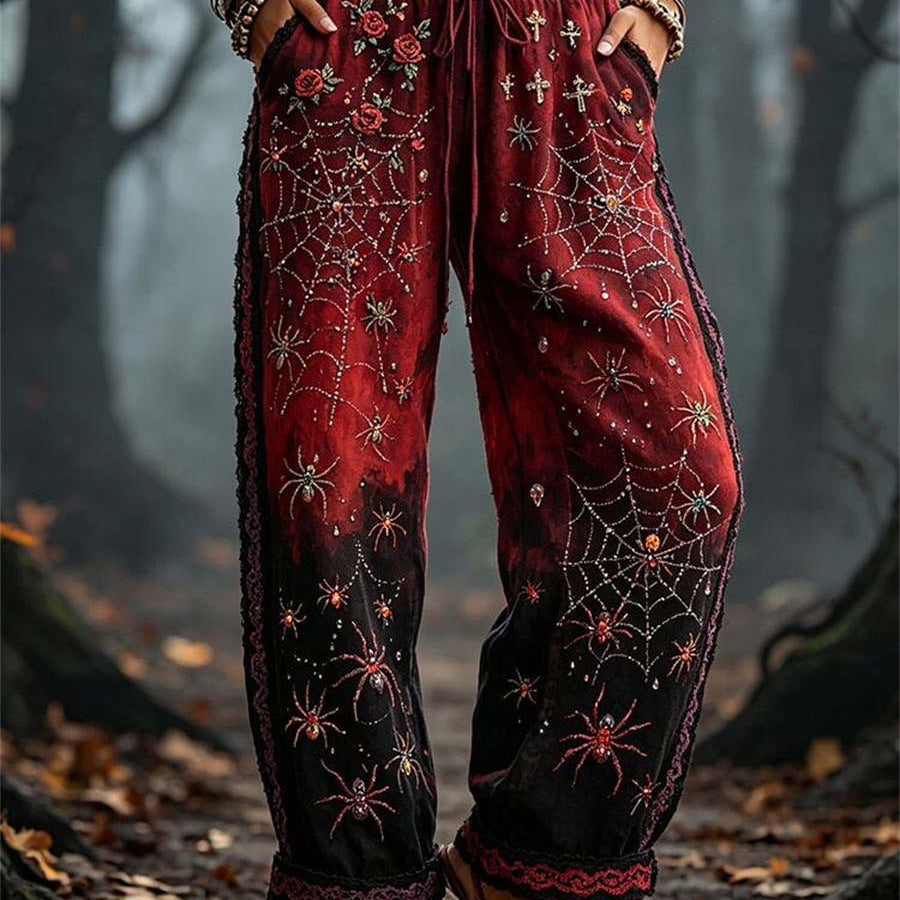 Holly Spider Web Rose Pants in red and black, front view