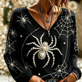 Delphine spiderweb v neck blouse in black, front view