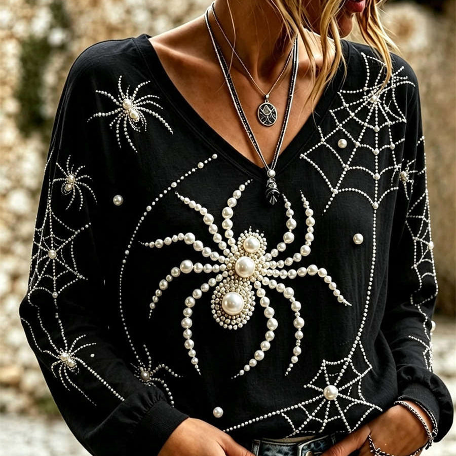 Delphine spiderweb v neck blouse in black, front view