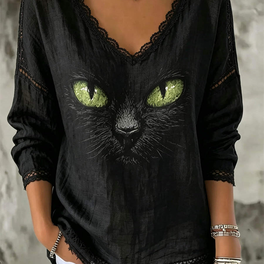 Aurora black cat v neck blouse in black, front view