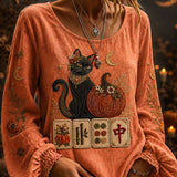 Alma Cat Pumpkin Mahjong Blouse in orange, front view