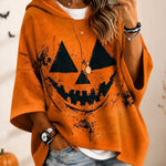 Aria pumpkin face hoodie in orange, front view