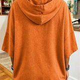 Aria pumpkin face hoodie in orange, back view
