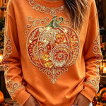 Zoe ornate pumpkin top in orange, front view