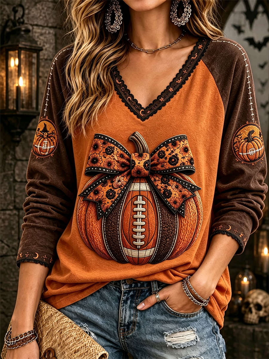 Olivia Pumpkin Bow V-Neck Top in orange and brown, front view