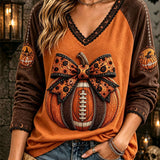 Olivia Pumpkin Bow V-Neck Top in orange and brown, front view