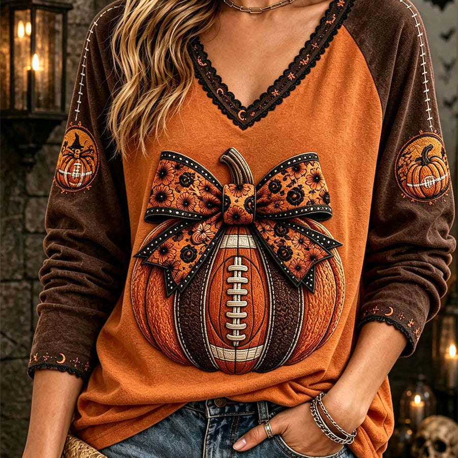 Olivia Pumpkin Bow V-Neck Top in orange and brown, front view