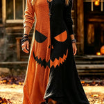 Iris pumpkin face maxi dress in orange, black, front view