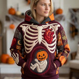Sadie Skeleton Pumpkin Belly Hoodie in burgundy, orange, beige, front view worn by a model