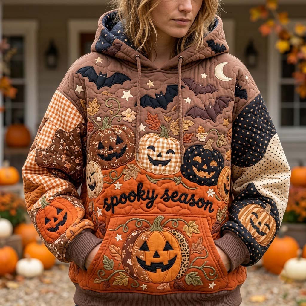 Lainey Spooky Pumpkin Patchwork Hoodie in brown, orange, black, front view worn by a model