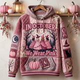 Margaret October Witch Trio Hoodie in pink, beige, front view on a hanger