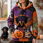 Vivian Dachshund Spooky Vibes Hoodie in purple, orange, black, front view worn by a model