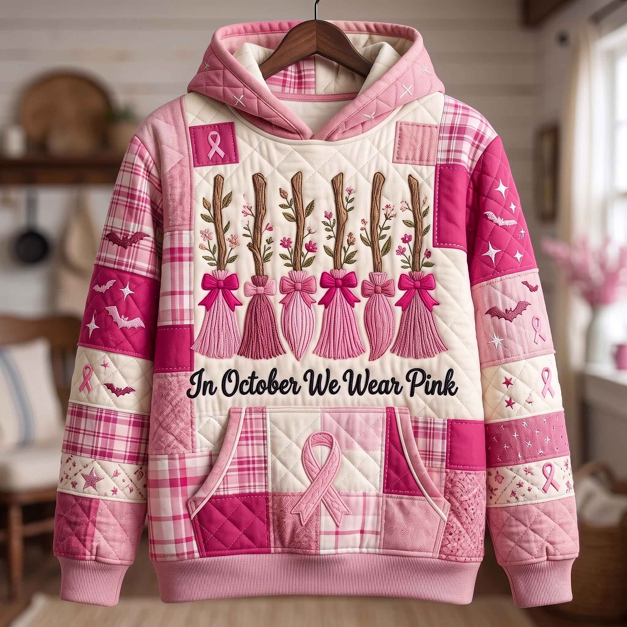 Mackenzie Pink Broom Ribbon Hoodie in pink, white, front view on a hanger