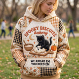 Claire Black Cat Bakery Hoodie in beige, orange, black, front view worn by a model
