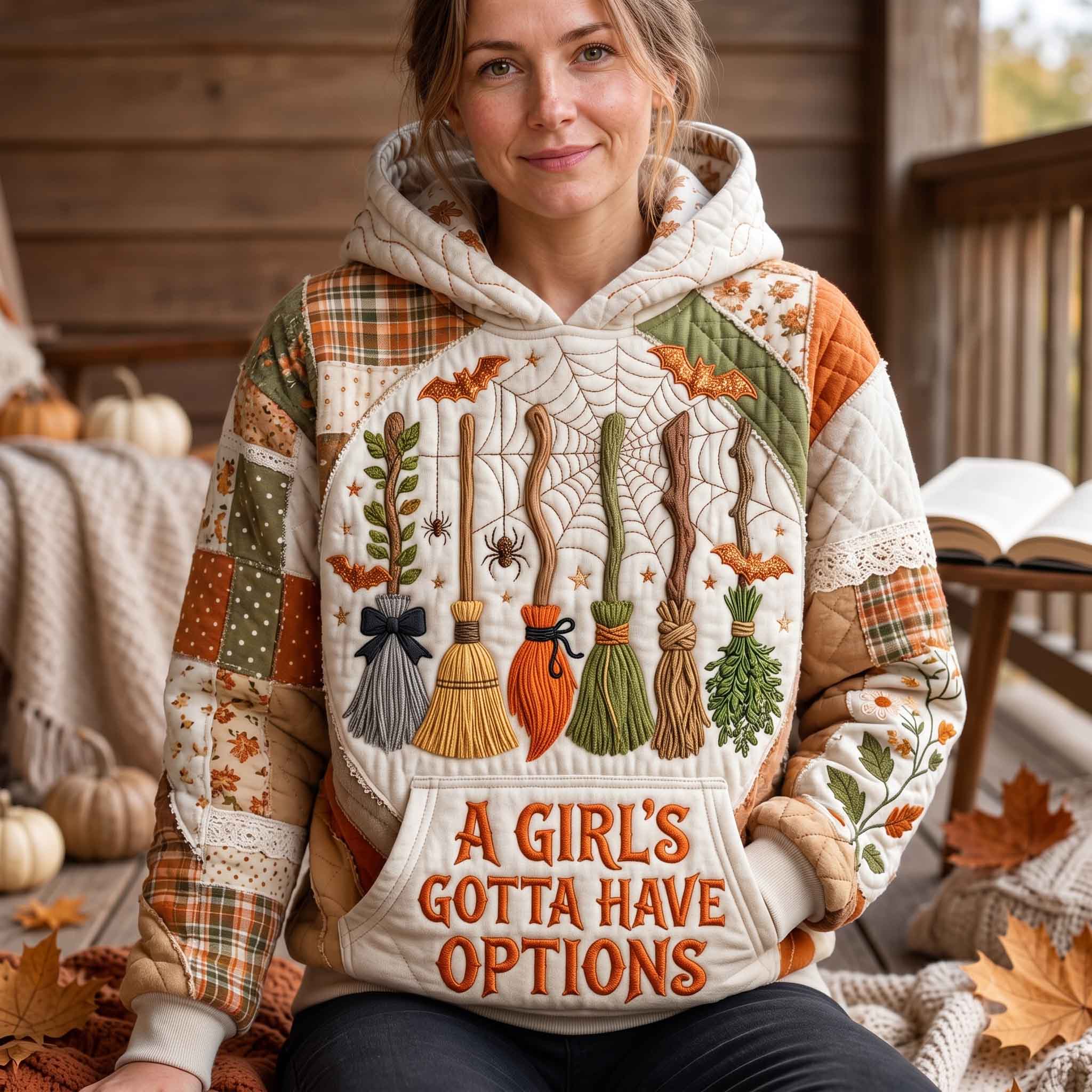 Sophia Witch Broom Patchwork Hoodie in beige, orange, green, front view worn by a model