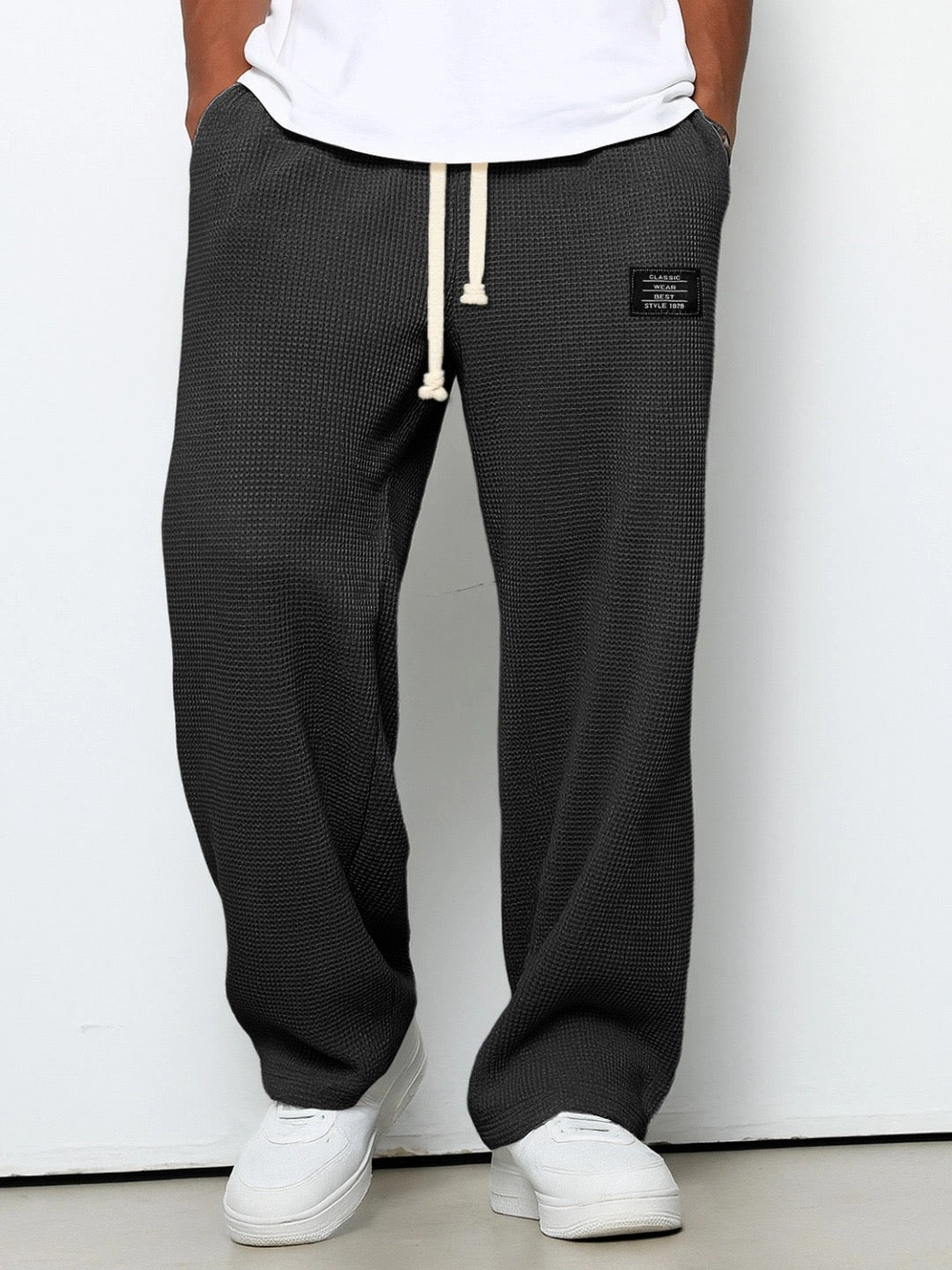 Hugh men's black waffle drawstring pants, front view
