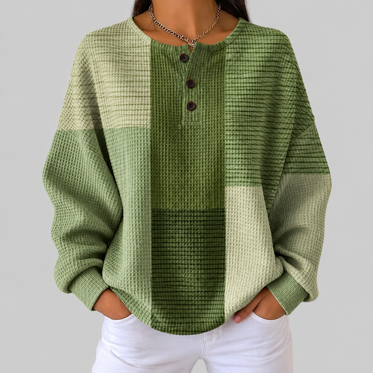 Charlotte green patchwork waffle knit sweater, front view