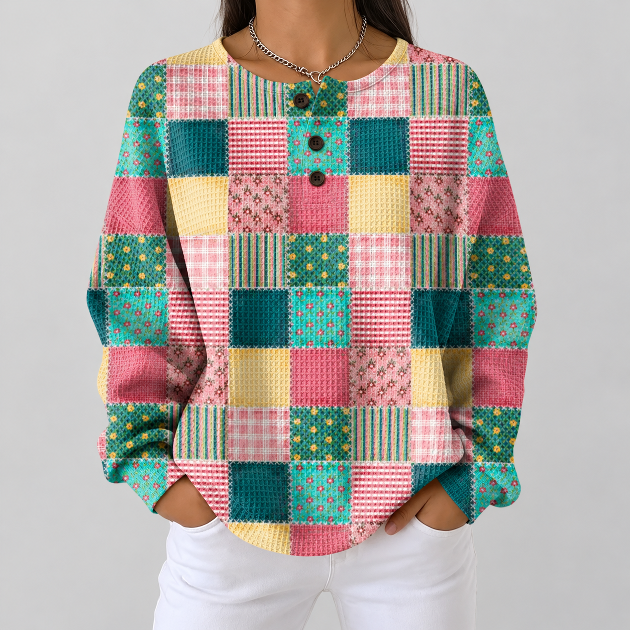 Ruth pink and turquoise patchwork waffle knit sweater, front view