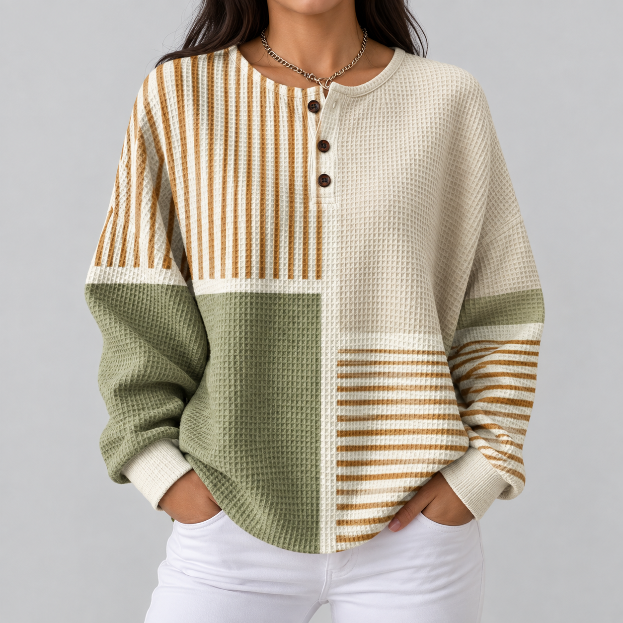 Lucy green and mustard patchwork waffle knit sweater, front view