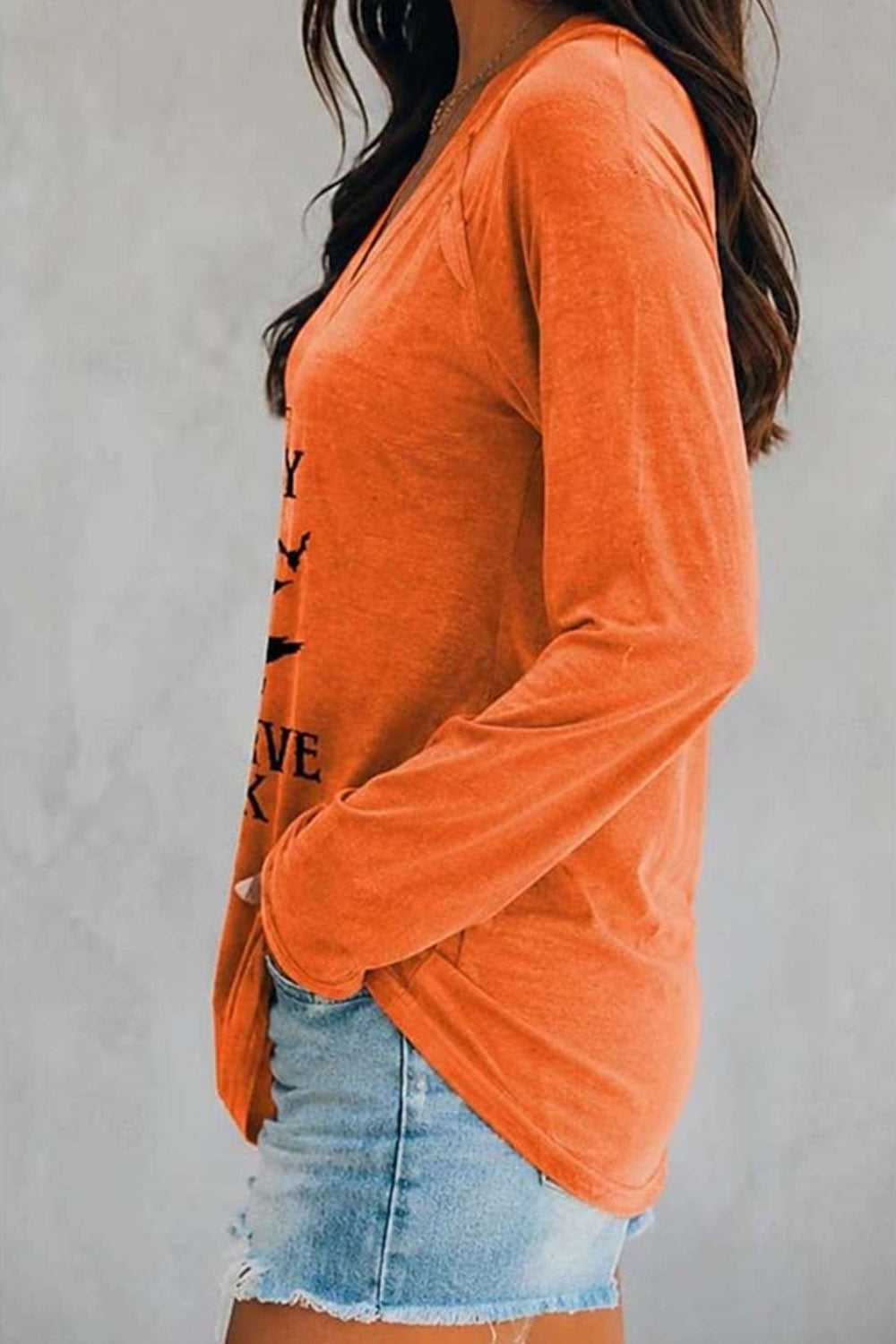 Sadie witch graphic v neck blouse in orange, side view