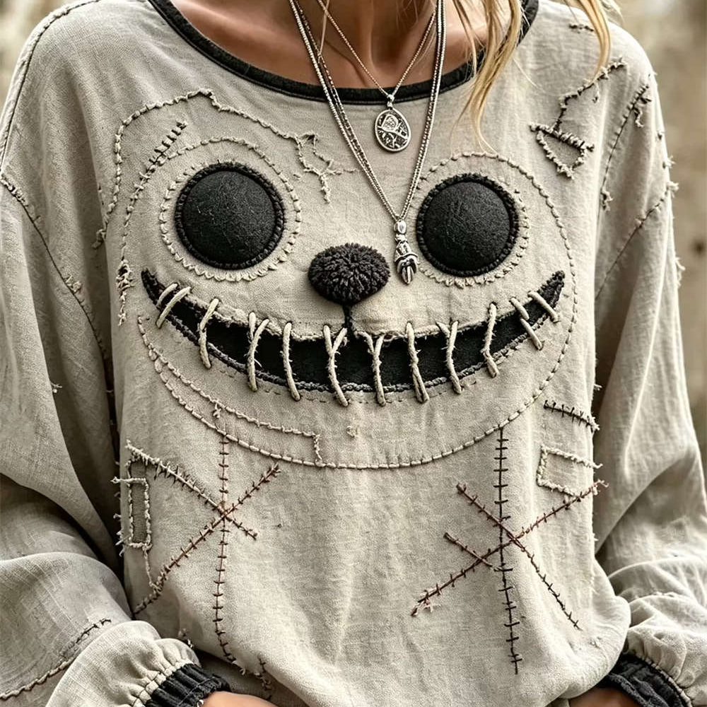 Noelle Stitched Ghost Face Blouse in beige, front view