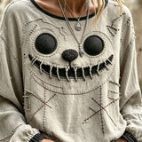 Noelle Stitched Ghost Face Blouse in beige, front view