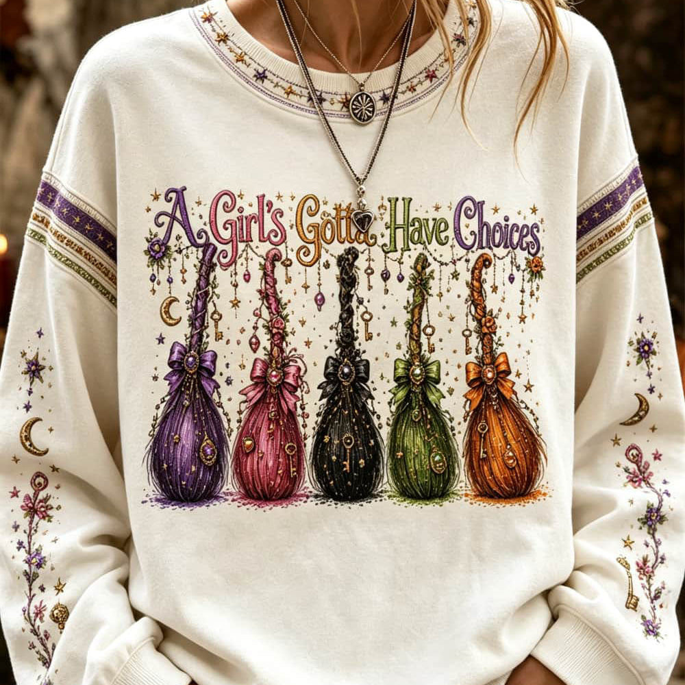 Genevieve witch broom sweatshirt in white, front view
