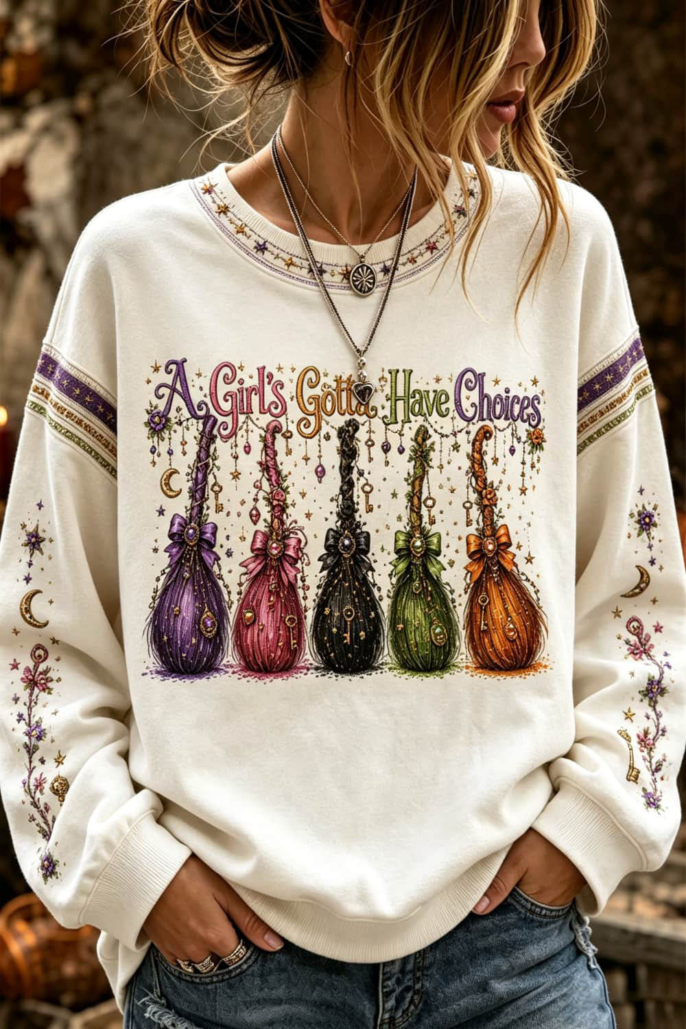 Genevieve witch broom sweatshirt in white, front view