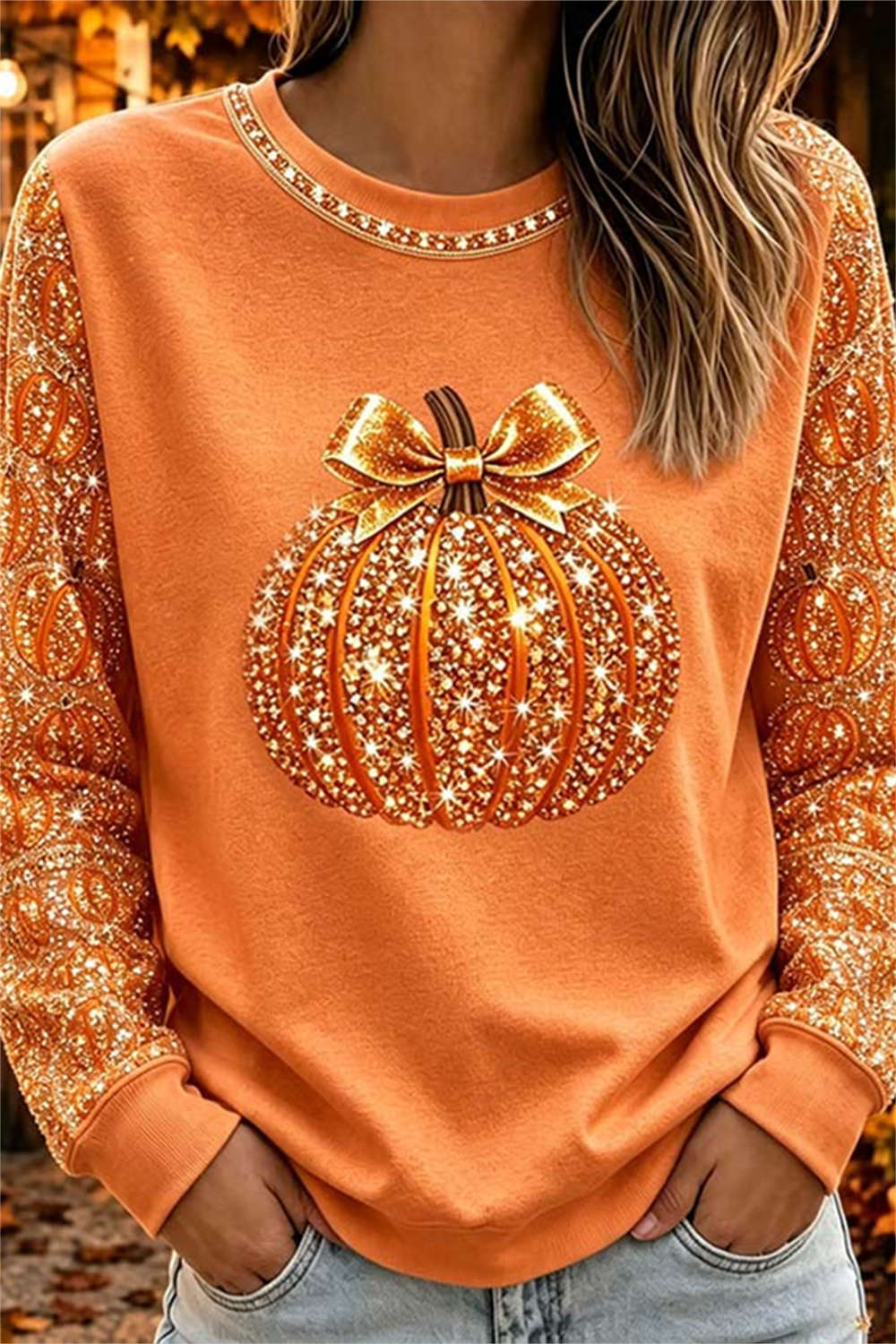 Ivy pumpkin bow top in orange, front view