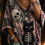 Ada skull cat v neck blouse in black, pink, front view