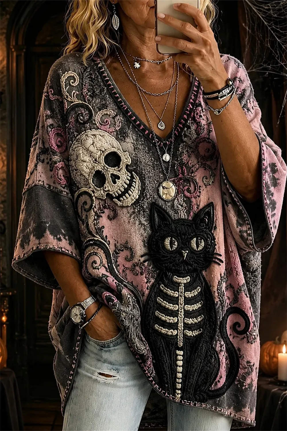 Ada skull cat v neck blouse in black, pink, front view