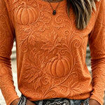 Elizabeth pumpkin leaf textured top in orange, front view