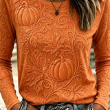 Elizabeth pumpkin leaf textured top in orange, front view