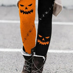 Grace pumpkin face leggings in orange, black, front view