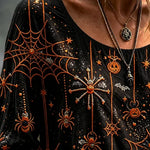 Josephine spiderweb pumpkin blouse in black, orange, detail view