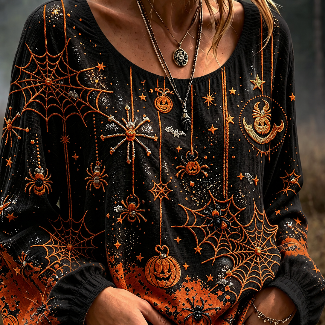 Josephine spiderweb pumpkin blouse in black, orange, front view