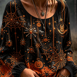 Josephine spiderweb pumpkin blouse in black, orange, front view