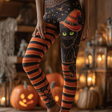 Angela Witch Cat Striped Leggings in black and orange, front view