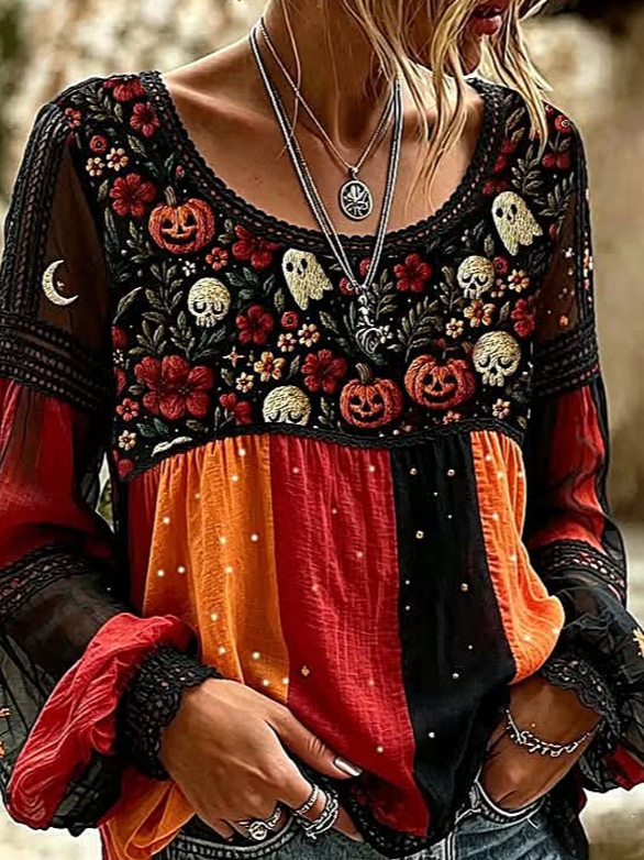 Lucia halloween floral blouse in black, orange, red, detail view