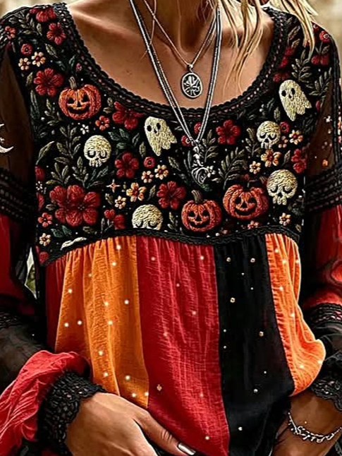 Lucia halloween floral blouse in black, orange, red, detail view