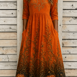 Gemma Pumpkin Vine A-Line Dress in orange, front view