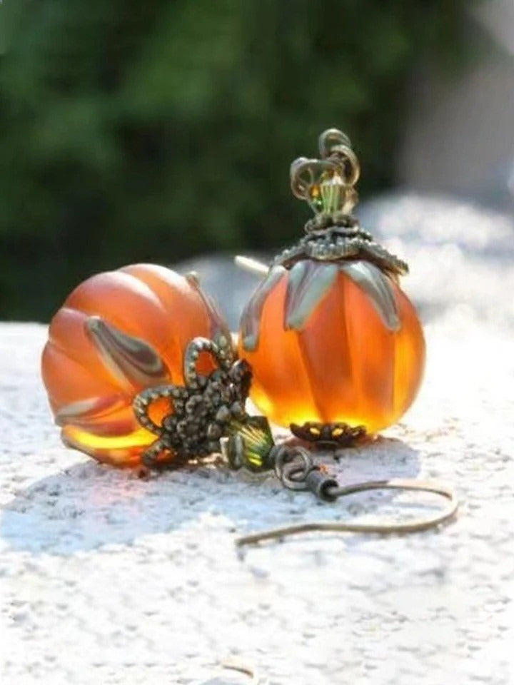 Sofia pumpkin earrings in orange, black, detail view