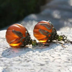 Sofia pumpkin earrings in orange, black, detail view