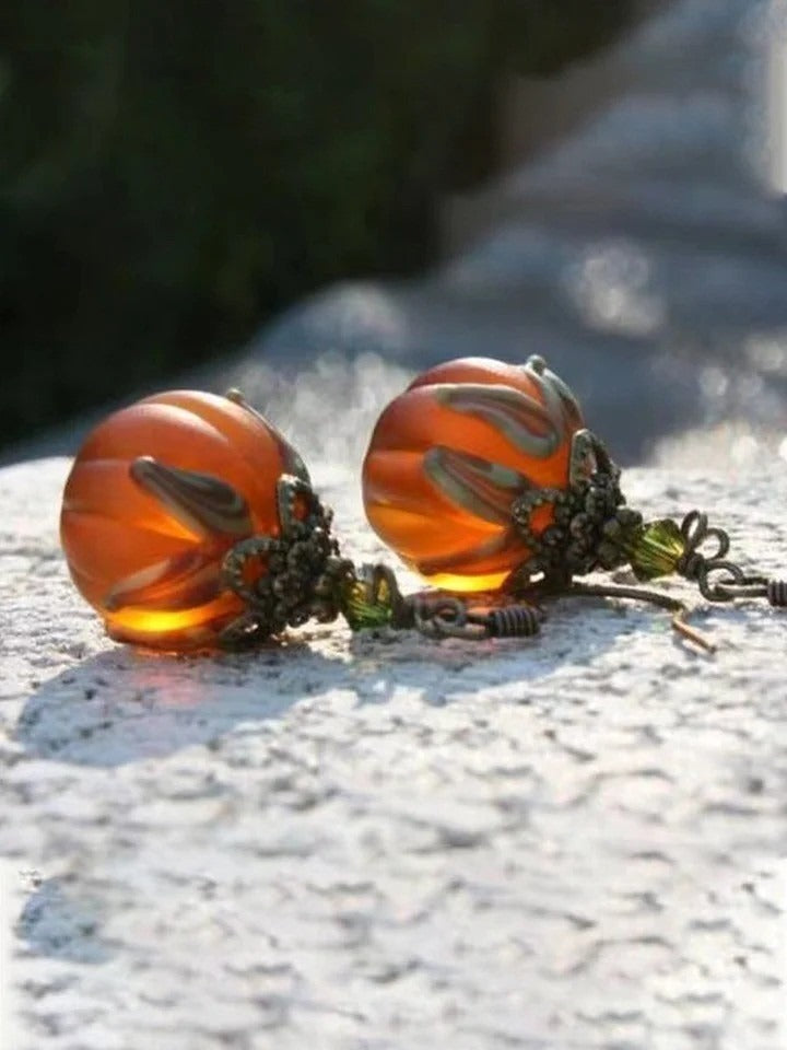 Sofia pumpkin earrings in orange, black, detail view