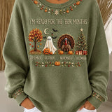 Mia fall holiday graphic sweatshirt in green, front view