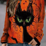 Kara Witch Cat Print Sweatshirt in orange, front view