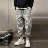 Zacharie men's brushed cuffed joggers in Gray, front view
